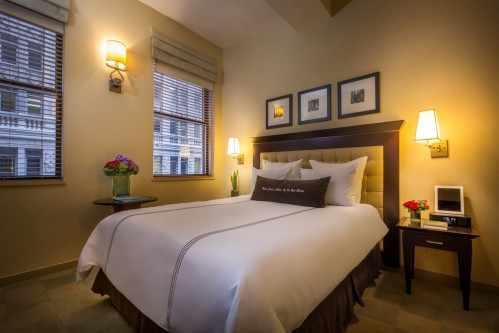 Deluxe Rooms with One Queen Bed are equipped with a mini fridge, in-room safe, iHome Alarm clock & radio, Cable TV & DVD player.